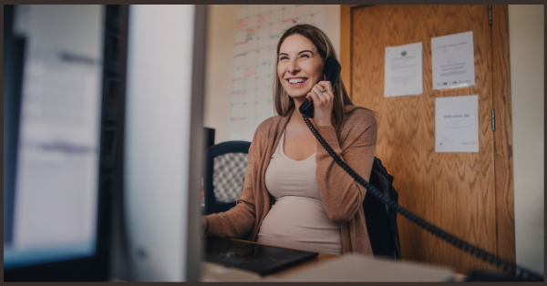 Pregnant woman on phone